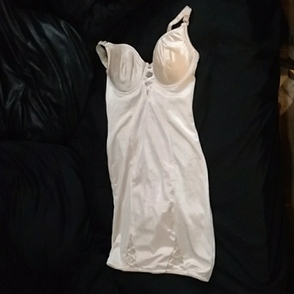 Shaping slip, with attached panty with snaps.